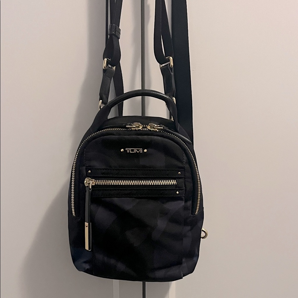 Tumi convertible backpack / crossbody bag